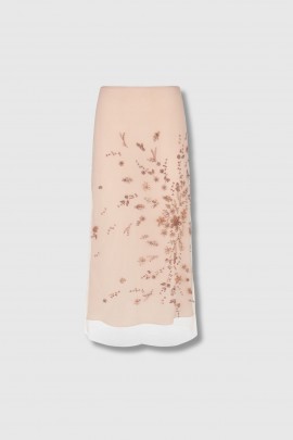 Pink tulle skirt with embroidery.
