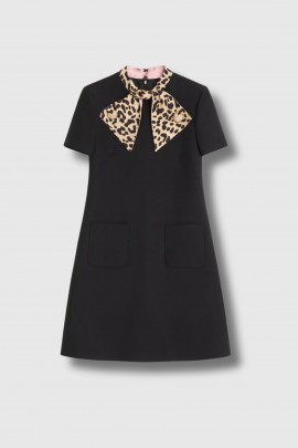 Black crepe couture dress with animal collar