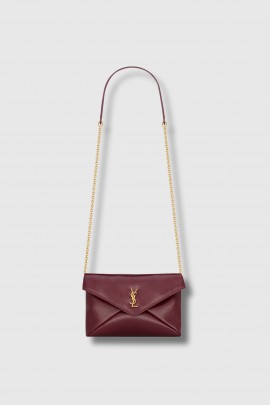 Cassandre chain clutch bag in shiny red ruby leather