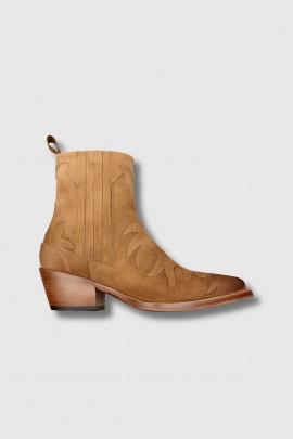 Camel suede cowboy boots with distressed soles